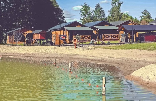 gmina Zakrzewo House | Enjoy your nature vacation on the lakeside of this cozy vacation home!