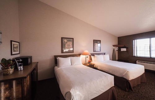 St. Joseph Hotel | Escapade into the Past - Rustic Charm with Modern Perks | 2 Units