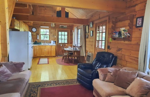 Willimantic Cabin | Escape to Howie's Camp: Unwind and Recharge at This Lakefront Log Cabin