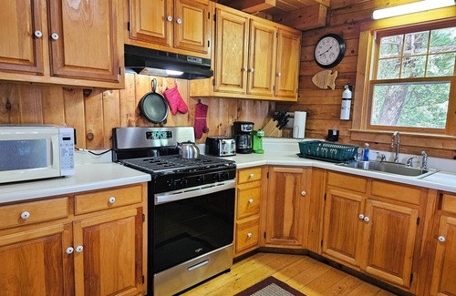 Willimantic Cabin | Escape to Howie's Camp: Unwind and Recharge at This Lakefront Log Cabin