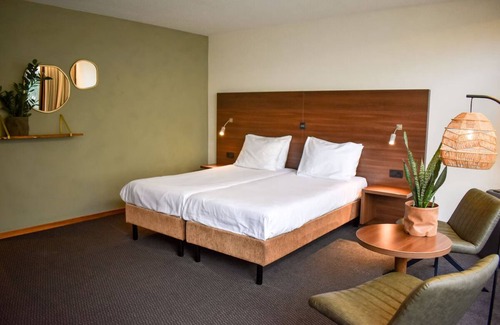 Bosschenhoofd Hotel | Escape to Nature from a Spacious Suite Near City Sights & Local Landmarks