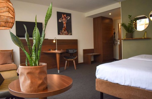 Bosschenhoofd Hotel | Escape to Nature from a Spacious Suite Near City Sights & Local Landmarks