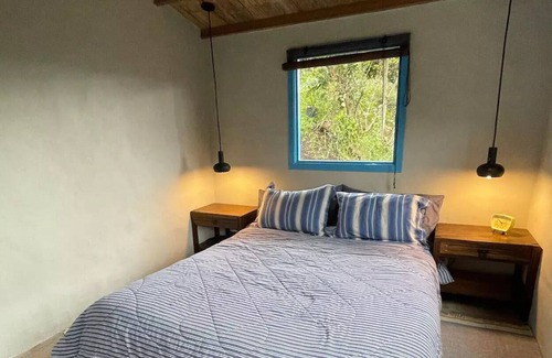 Tabio Cottage | Escape to our Tiny House Cabin: An oasis of peace and tranquility.