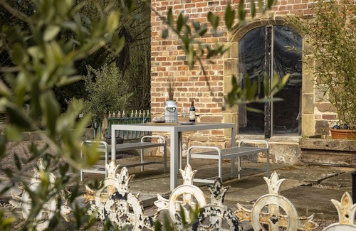 Bromsgrove Apartment | Exposed timbers, a feature stone fireplace, flagstone and oak floors – The Chapel has a wealth of pe