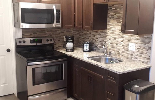 Timberlea Apartment | Exquisitely Furnished 2 Bedroom Suite with Heated Floors