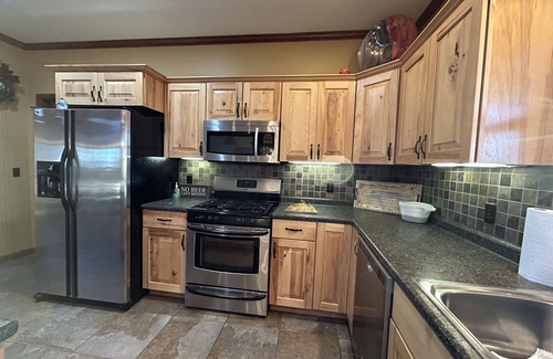 Springville House | Fabulous Lakeview home with stone fireplace located in Springville/Buchanan