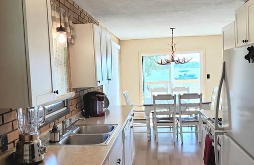 Sister Lakes Cottage | Family Friendly Lakefront Whimsical Cottage with Beach in Sister Lakes, Michigan