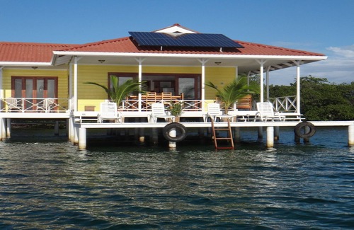 Punta Caracol House | Family-friendly Unforgettable Vacation at over the water house.