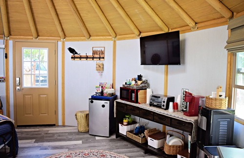 Hillside East Cabin | Fanciful mountainside yurt with private bathhouse