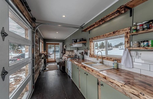 Ovando Apartment | Farm Stay, 1-bedroom custom built shipping container on the river.