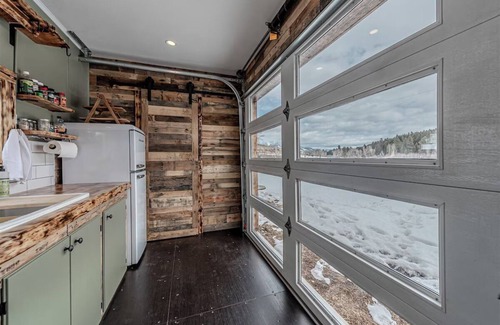 Ovando Apartment | Farm Stay, 1-bedroom custom built shipping container on the river.