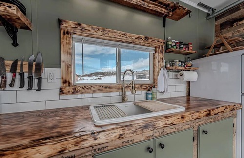 Ovando Apartment | Farm Stay, 1-bedroom custom built shipping container on the river.