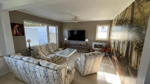 Bad Hersfeld House | Ferienhaus Platzhirsch in Bad Hersfeld mit Garten, 2 Bäder, 3 Schlafzimmer & Küche - gratis Parkplätze