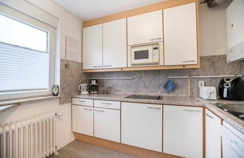 Berumbur House | Ferienhaus Wacholder is located in Berum and is the ideal accommodation for a relaxing vacation.