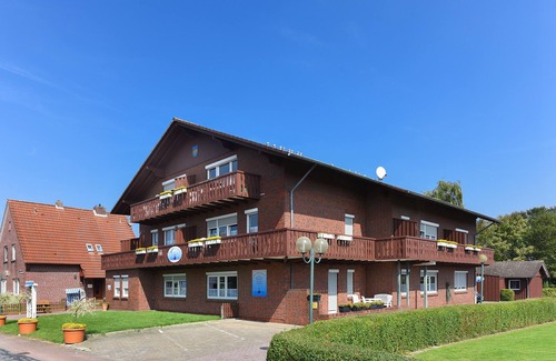 Neuharlingersiel Apartment | Ferienwohnung Störtebecker - Haus Hafenromantik in Neuharlingersiel