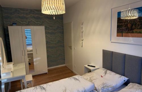 Krippen Apartment | Ferienwohnung Lucy - Moderne Ferienwohnung mit kostenlosem Parkplatz, Terrasse, nahe Bad Schandau und Malerweg
