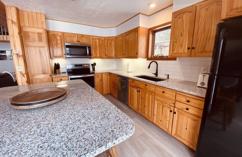 Wautoma Ski Chalet | Fire pit! Hot tub! Game room! Kayaks!