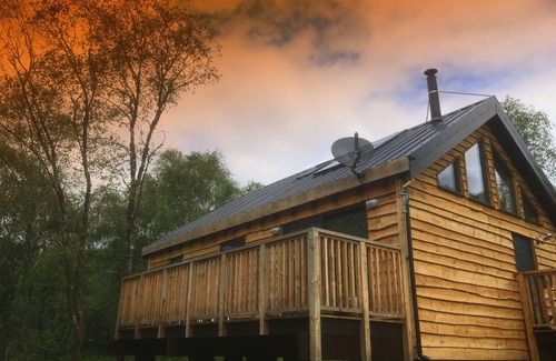 Dallavich Cabin | Flora is a Well equipped, Scandinavian style log cabin with wood fired hot tub