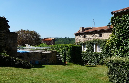 Chalus House | Former priory with garden, located above the village