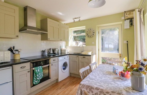 West Bexington Cottage | FOSSIL AND THE CROSS COTTAGE, pet friendly in West Bexington