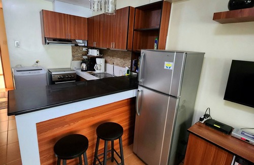 Cagayan de Oro Condo | Fully furnished with Self check in, Pool & Netflix at One Oasis Condominium CDO