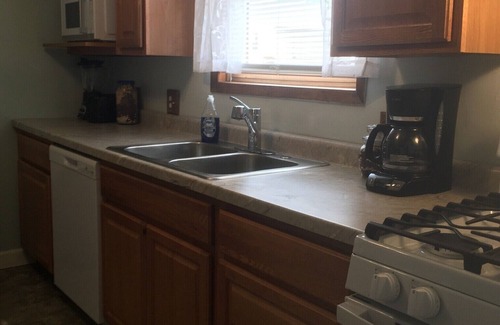 Minot House | Furnished 1-Bed 1-Bath entire Apt in House - Private Entrance includes utilities