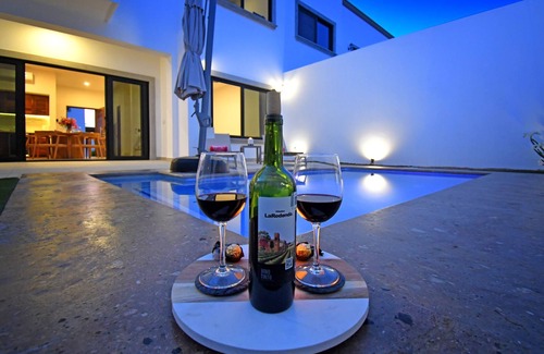 Esterito House | Gated 3BD+Office/flex bedroom, Sleeps 8, HTD Pool, Rooftop, 2 Blks to Malecon