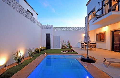 Esterito House | Gated 3BD+Office/flex bedroom, Sleeps 8, HTD Pool, Rooftop, 2 Blks to Malecon