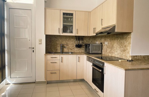 Lithinai Apartment | Gezellig en Modern Familie Appartement met Twee Zwembaden en 350m tot het Strand