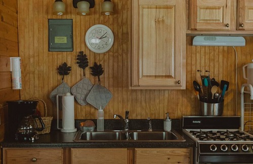 Seeley Lake Cabin | Glacier Cabin at Tamaracks Resort is a cozy cabin with a Seeley Lake view.