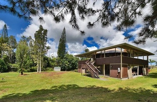 Hawaiian Acres Cottage | "Glamping" at its finest with wrap around lanai and jetted tub
