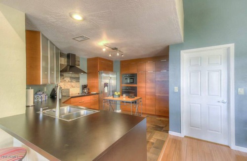 Red Mountain Ranch House | Golf course view retreat in Mesa.