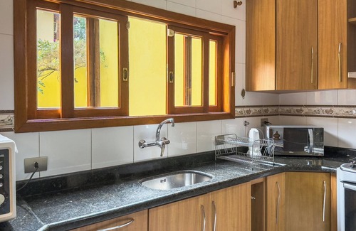 Carapicuiba House | Gourmet space and home-office in Granja