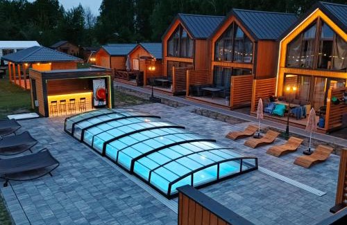 Mszczonow Resort | GRABSKA OSADA APARTAMENTY - 100m od Suntago Park-domki ogrzewane całoroczne