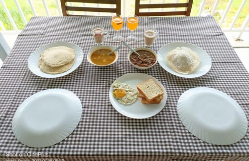 Kunchithanny House | Grace Munnar Resort