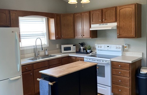 Jacksboro Cabin | Gravel Parking for Boats/Atv, single slip, located near Indian River Marina