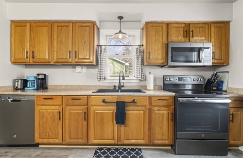 Warren House | Great Location! Cozy Home with Huge Backyard