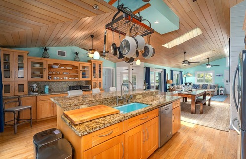 Sugarloaf Shores House | Green Turtle Oasis: Lovely 4BR Canal Front Home, Pool, Dockage, Tiki, Outdoor Dining & Pet Friendly!