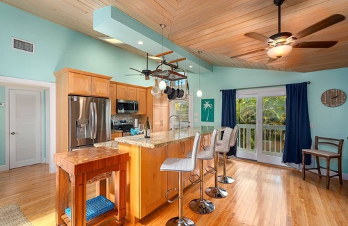 Sugarloaf Shores House | Green Turtle Oasis: Lovely 4BR Canal Front Home, Pool, Dockage, Tiki, Outdoor Dining & Pet Friendly!