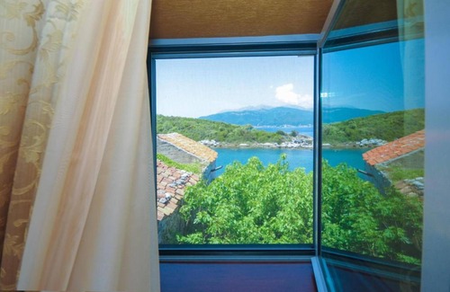 Tivat Apartment | Ground floor apartment, private beach and seaview