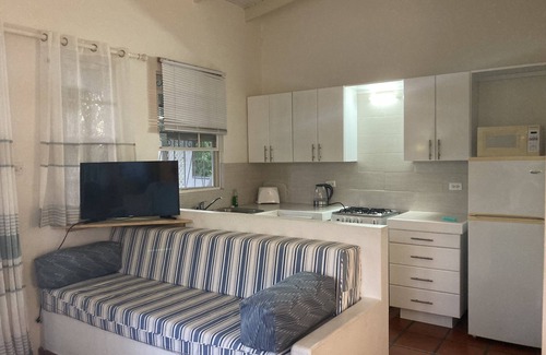 Sunset Crest Apartment | Ground Floor Apt with garden only 3 mins walk to Beach and Beach Club