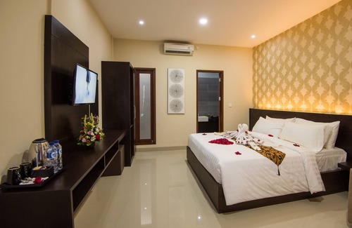 Legian House | Guest suite at Bisma House, with pool in Legian