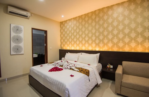 Legian House | Guest suite at Bisma House, with pool in Legian