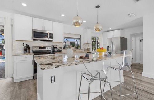 Eight Lakes House | Gulf Access, Heated Pool, Dock, Lanai – Sunset Coast Bungalow - Roelens