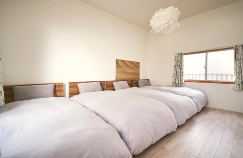 Ikuno House | haco momodani Spacious with high ceilings