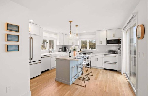 East Orleans House | Harbor Vista: 003-O Sleek & Modern East Orleans Retreat with Stunning Ocean Views