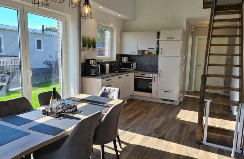 Sehestedt House | Haus KüstenBrise - Urlaub mit Hund an der Küste mit eigenen Garten, Sauna und gemütlichen Kaminfeuer