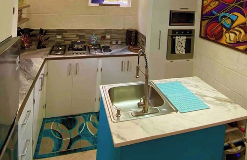 West Coast Apartment | Have fun with the whole family at this stylish place with smart home features