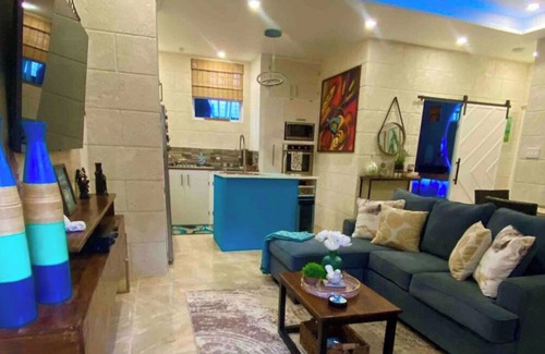 West Coast Apartment | Have fun with the whole family at this stylish place with smart home features
