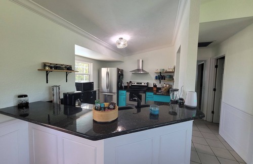Gulf Cove House | Heated Pool & Spa Pet Friendly Tropical Home